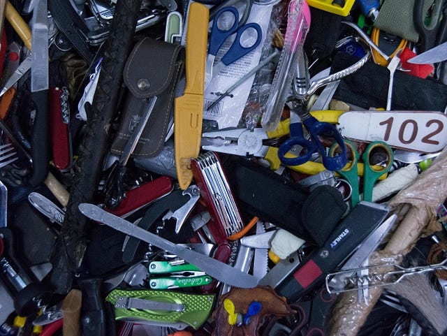 Disposal bin at airport for sharp objects