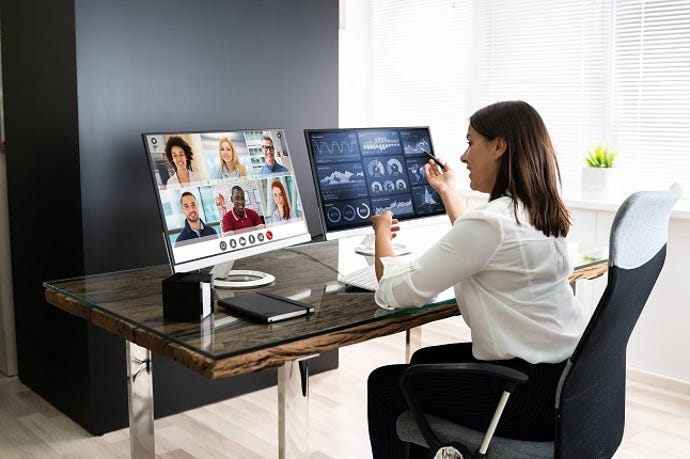 women working remotely on a video conference with team members